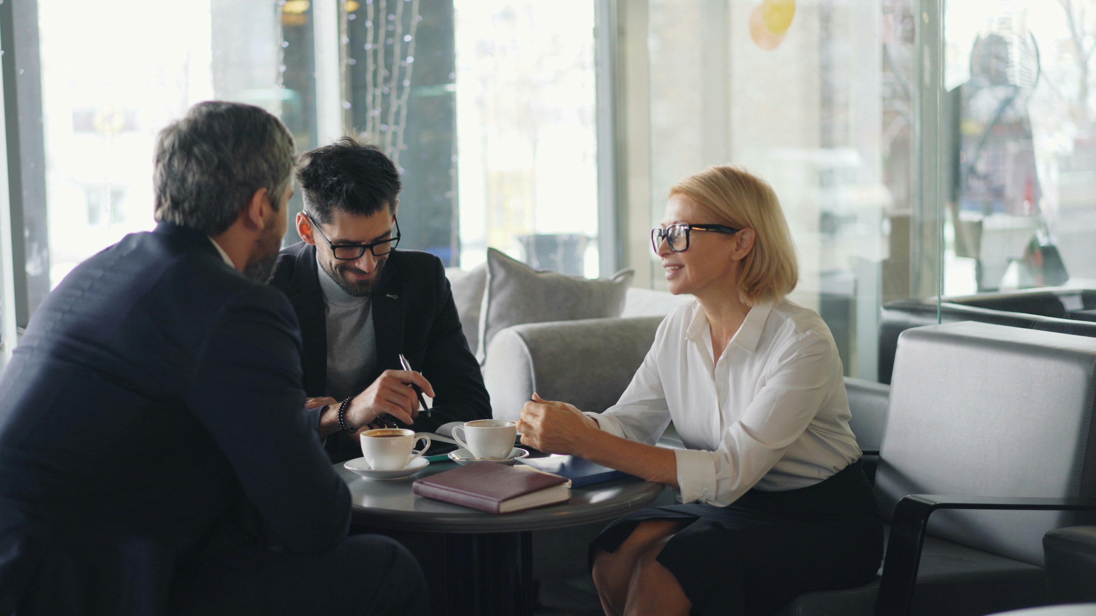 Property managers reviewing HOA matters with counsel